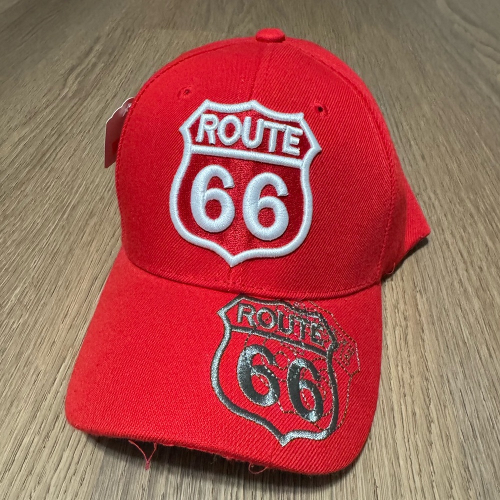 Two route 66 hats one white one red